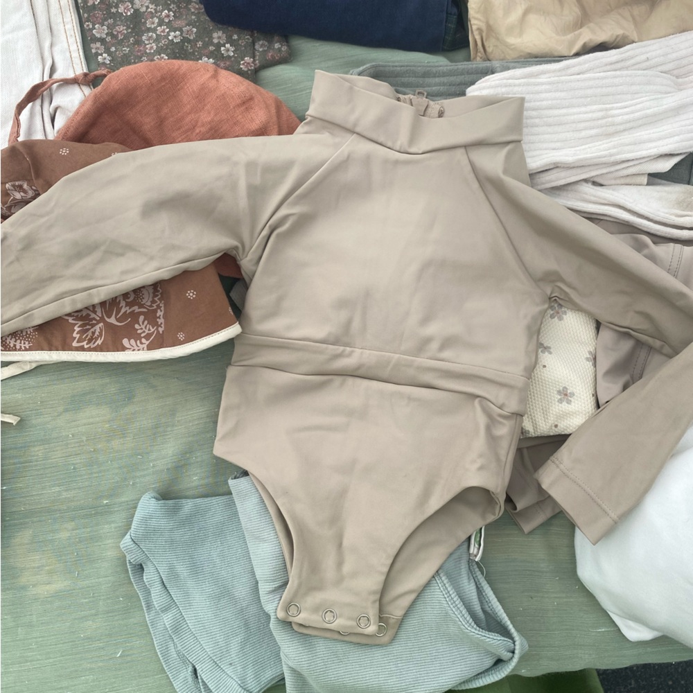 Baby and toddler swimsuits, excellent used condition